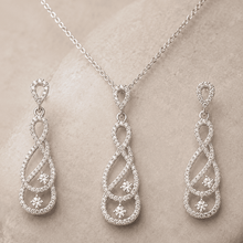 The "Pinky Promise" Infinity Set — Silver-Tone Infinity Grace Pendant Set by House of Zena, close-up detail