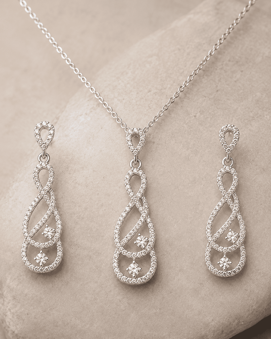 The "Pinky Promise" Infinity Set — Silver-Tone Infinity Grace Pendant Set by House of Zena, close-up detail