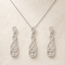 The "Pinky Promise" Infinity Set — Silver-Tone Infinity Grace Pendant Set by House of Zena, worn on model