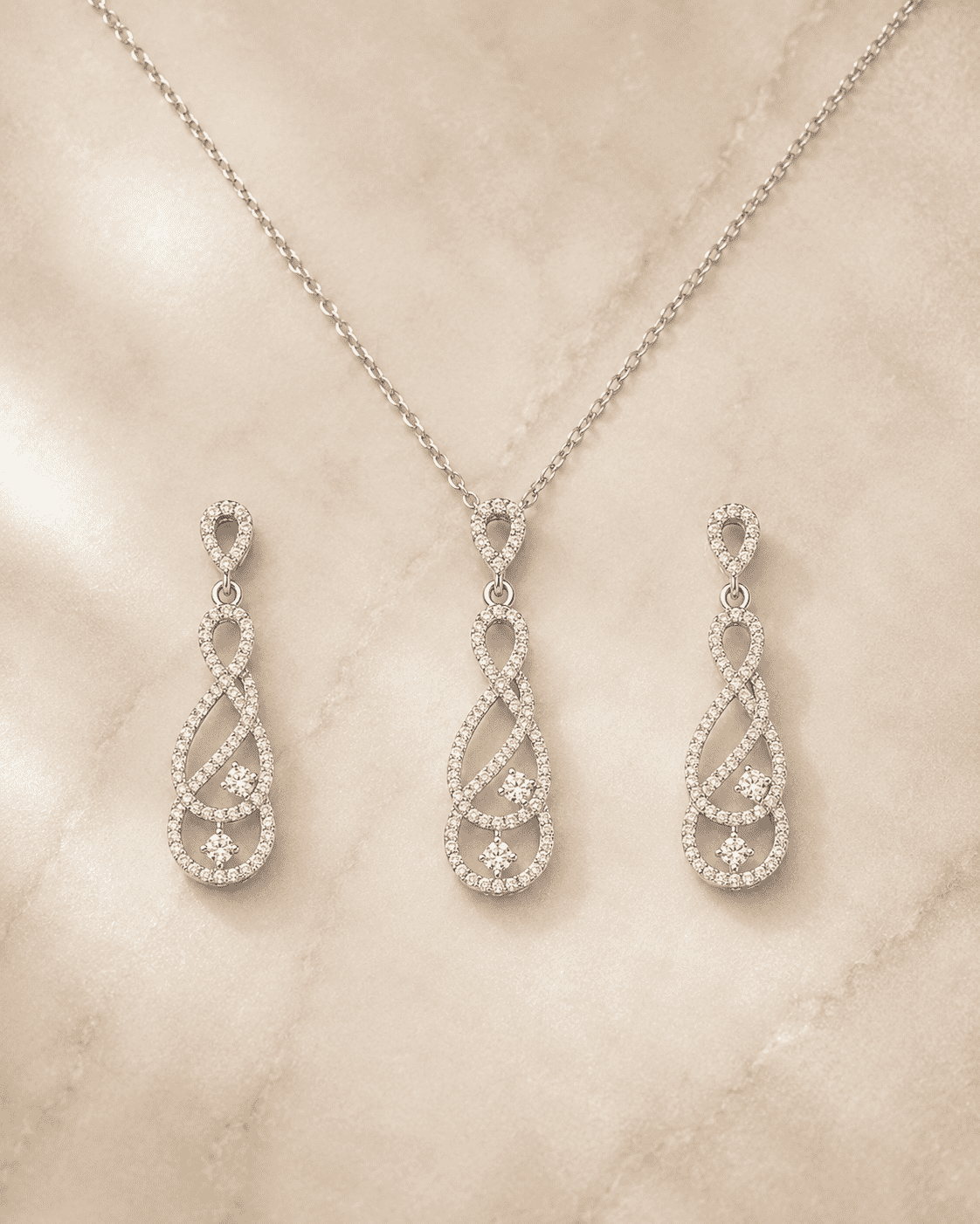 The "Pinky Promise" Infinity Set — Silver-Tone Infinity Grace Pendant Set by House of Zena, side angle