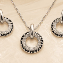 The Black Truffle Midnight Set — Silver-Tone Halo Pendant Set by House of Zena, close-up detail
