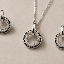 The Black Truffle Midnight Set — Silver-Tone Halo Pendant Set by House of Zena, styled on model