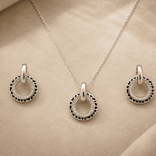 The Black Truffle Midnight Set — Silver-Tone Halo Pendant Set by House of Zena, side angle