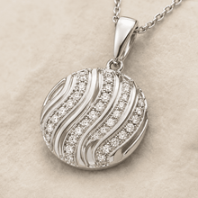 The Golden Hour Ripple Set — Silver-Tone Wave Pendant Set by House of Zena, close-up detail