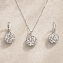 The Golden Hour Ripple Set — Silver-Tone Wave Pendant Set by House of Zena, worn on model