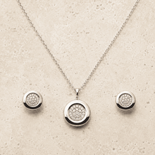 The Mooncake Pearl Glow Set — Silver-Tone Glow Pendant Set by House of Zena, worn on model