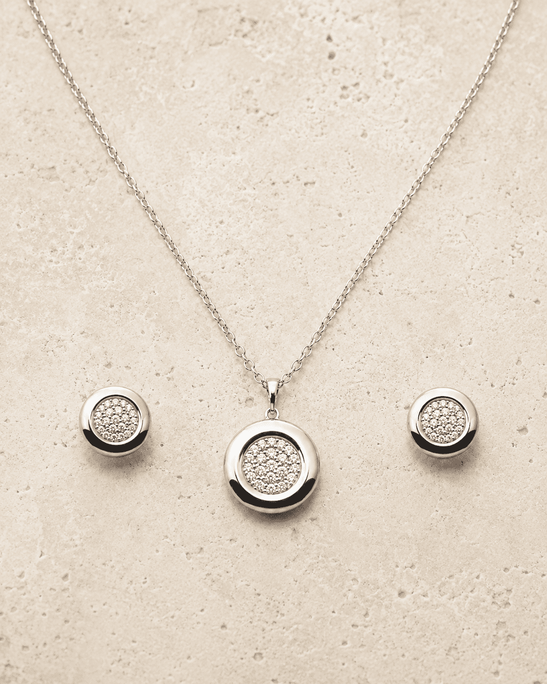 The Mooncake Pearl Glow Set — Silver-Tone Glow Pendant Set by House of Zena, worn on model