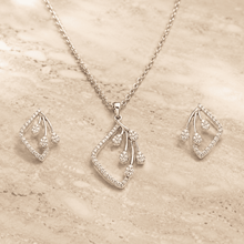 The Morning Dewdrop Set — Silver-Tone Dewdrop Elegance Pendant Set by House of Zena, worn on model