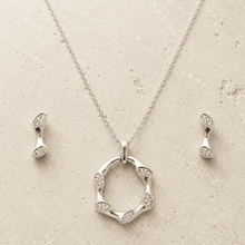The Mobius Knot Eternal Set — Gold Plated Loop Pendant Set by House of Zena, worn on model