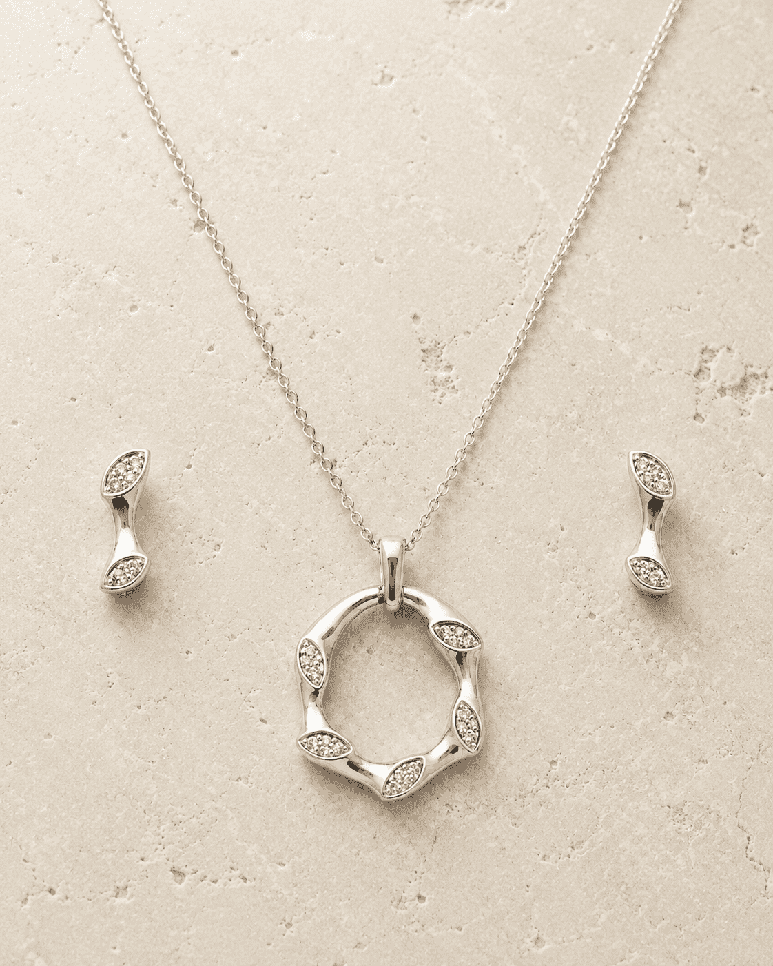 The Mobius Knot Eternal Set — Gold Plated Loop Pendant Set by House of Zena, worn on model