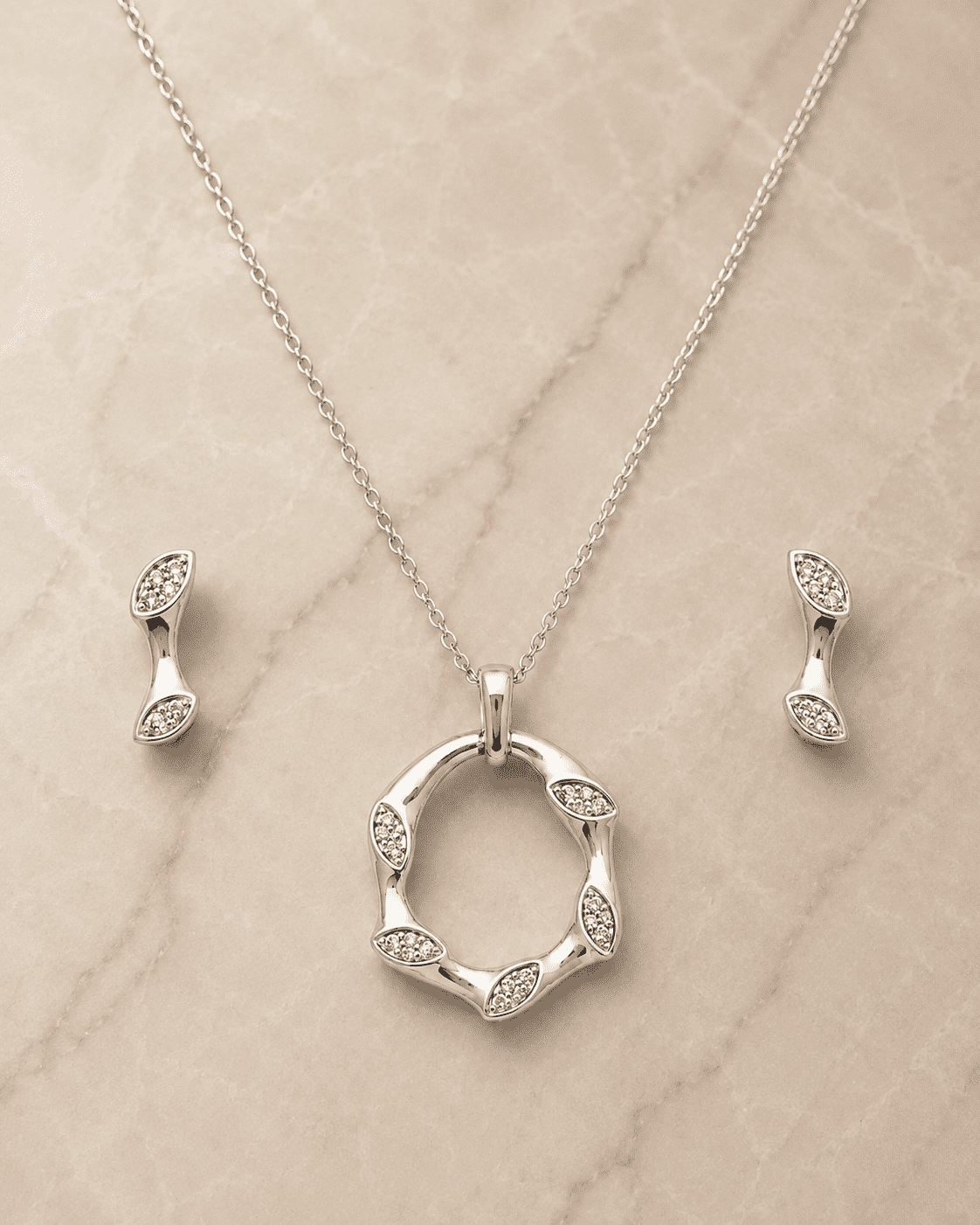 The Mobius Knot Eternal Set — Gold Plated Loop Pendant Set by House of Zena, side angle