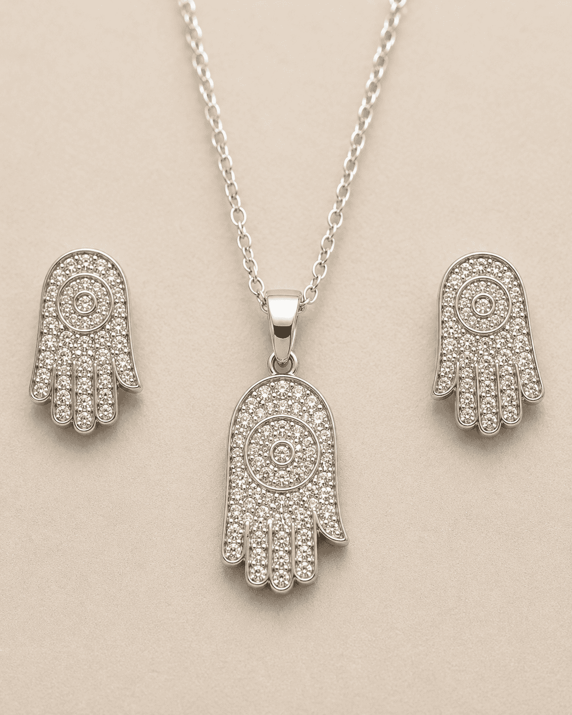 The "Holy Grail" Protection Set — Gold Plated Hamsa Pendant Set by House of Zena, worn on model