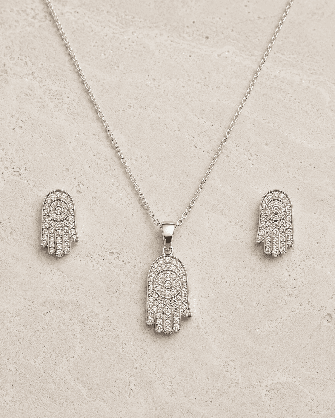 The "Holy Grail" Protection Set — Gold Plated Hamsa Pendant Set by House of Zena, side angle