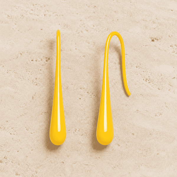The Sunny Lemon Mini Huggies — Gold Plated Sunbeam Drop Huggie Earrings by House of Zena, styled on model — Anti-Tarnish Waterproof Jewellery | House of Zena