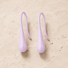 The Wild Lavender Mini Huggies — Gold Plated Lilac Drop Huggie Earrings by House of Zena, worn on model