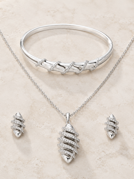 Luna Wave Jewellery Set
Includes
Pendant Necklace
Statement Bracelet
Matching Stud Earrings
