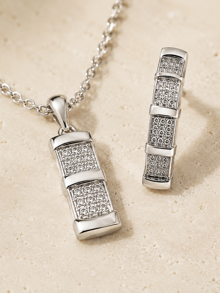 Nova Grid Jewellery Set
Includes
Pendant Necklace
Statement Bracelet
Matching Earrings