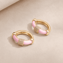 The Strawberry Milk Huggies — Gold Plated Blush Halo Huggie Earrings by House of Zena, side angle