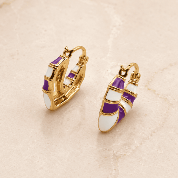 The Lavender Swirl Huggies — Gold Plated Amethyst Swirl Huggie Earrings by House of Zena, styled on model — Anti-Tarnish Waterproof Jewellery | House of Zena