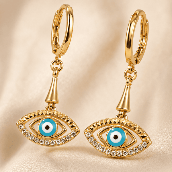 The Side-Eye Charm Drops — Gold Plated Evil Eye Drop Earrings by House of Zena, styled on model — Anti-Tarnish Waterproof Jewellery | House of Zena