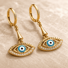 The Side-Eye Charm Drops — Gold Plated Evil Eye Drop Earrings by House of Zena, close-up detail
