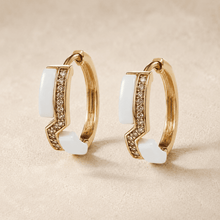 The Oyster Pearl Crescent Hoops — Gold Plated Pearl Curve Hoop Earrings by House of Zena, worn on model