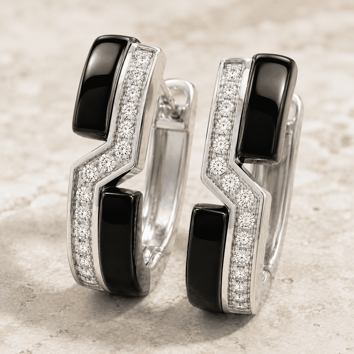 The Black Sesame Crescent Hoops — Silver-Tone Curve Hoop Earrings by House of Zena, side angle