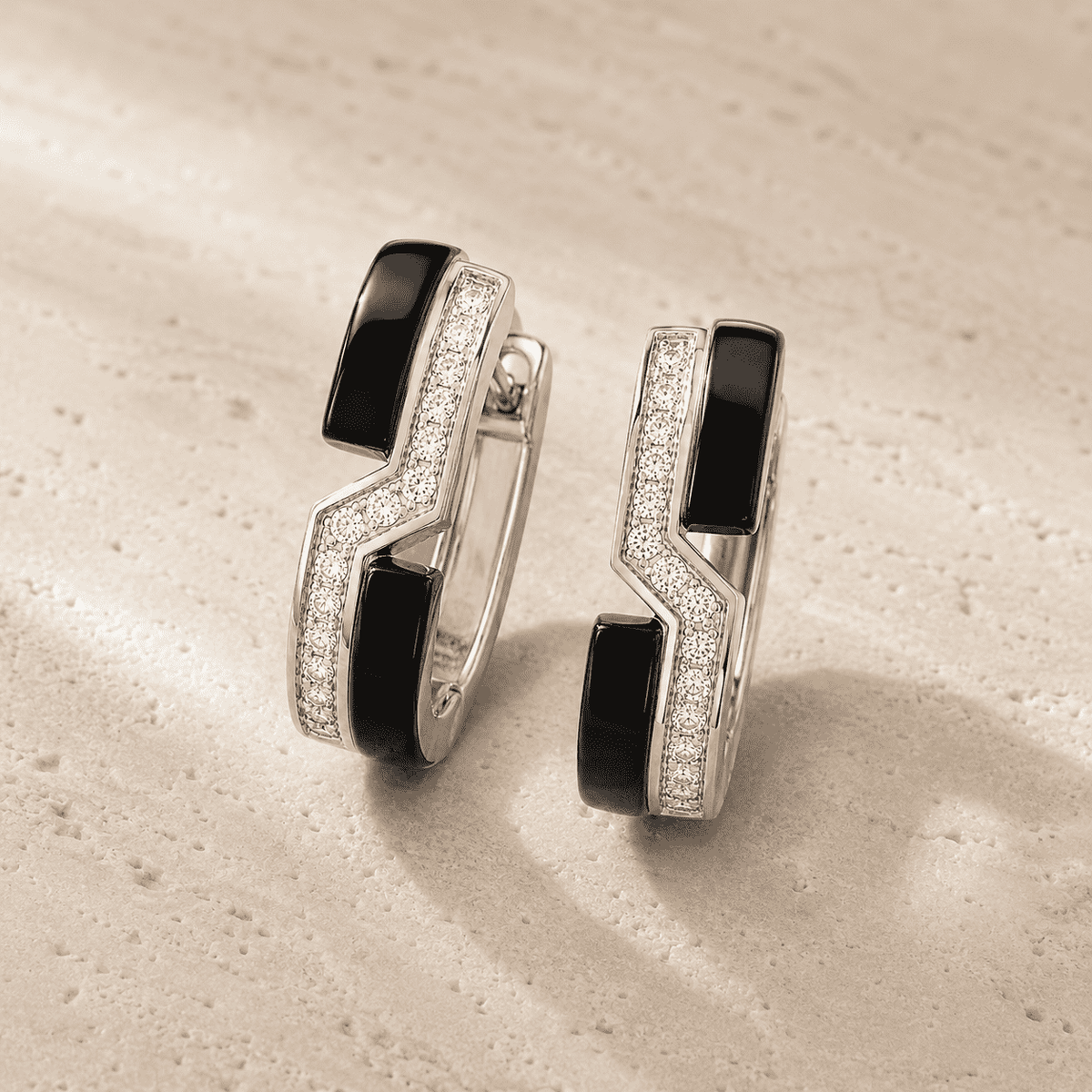 The Black Sesame Crescent Hoops — Silver-Tone Curve Hoop Earrings by House of Zena, close-up detail