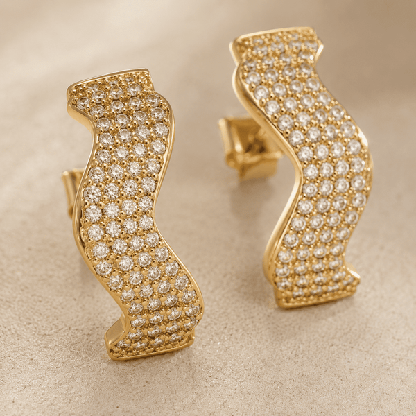 The Golden Nugget Huggies — Gold Plated Wave Crystal Huggie Earrings by House of Zena, styled on model — Anti-Tarnish Waterproof Jewellery | House of Zena