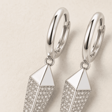 The Diamond Dust Prism Drops — Silver-Tone Silver Prism Luxe Drop Earrings by House of Zena, worn on model