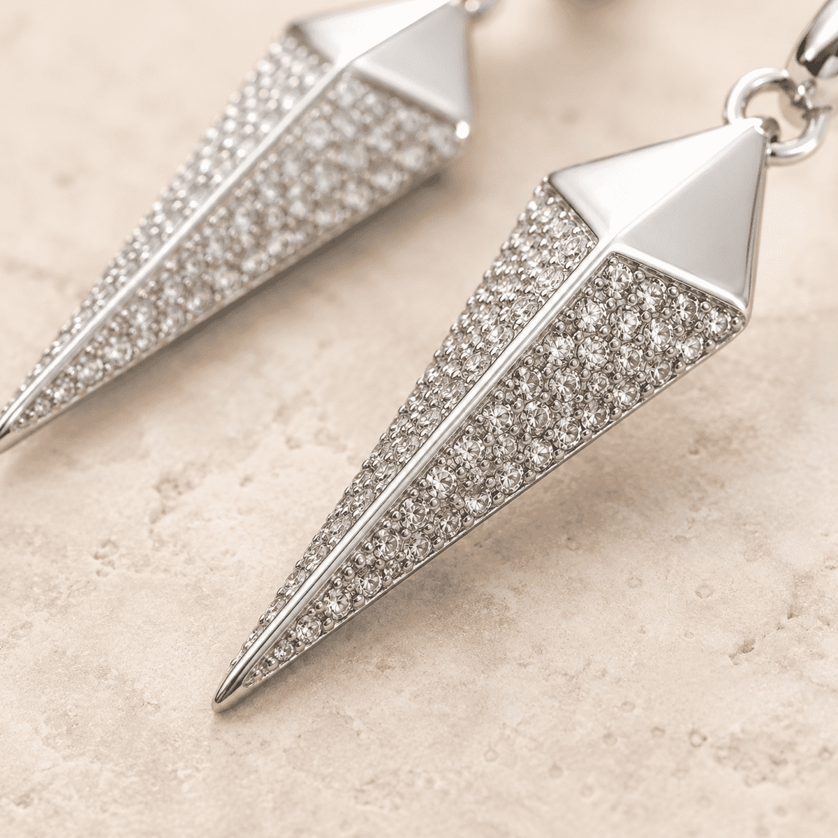The Diamond Dust Prism Drops — Silver-Tone Silver Prism Luxe Drop Earrings by House of Zena, side angle