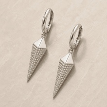 The Diamond Dust Prism Drops — Silver-Tone Silver Prism Luxe Drop Earrings by House of Zena, styled on model