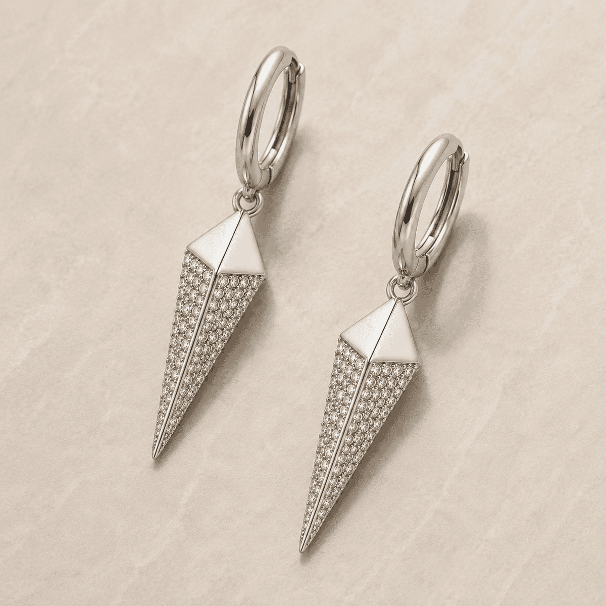 The Diamond Dust Prism Drops — Silver-Tone Silver Prism Luxe Drop Earrings by House of Zena, styled on model