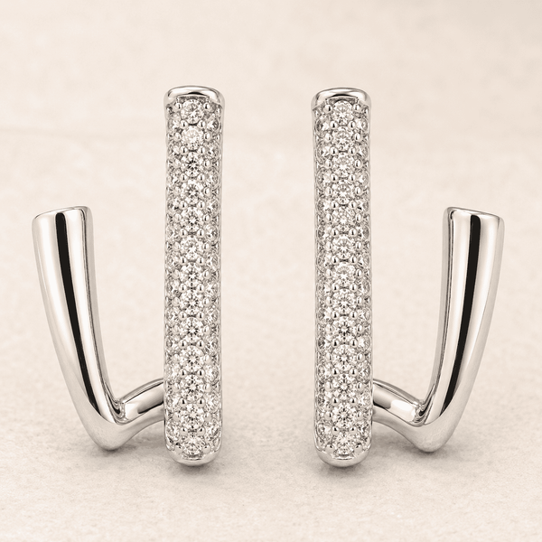 The Crisscross Pavé Illusion Hoops — Silver-Tone Dual Curve Pavé Hoop Earrings by House of Zena, styled on model — Anti-Tarnish Waterproof Jewellery | House of Zena