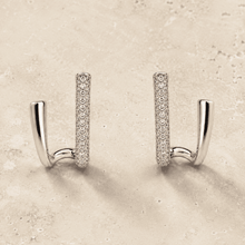 The Crisscross Pavé Illusion Hoops — Silver-Tone Dual Curve Pavé Hoop Earrings by House of Zena, side angle