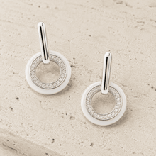 The Floating Orbit Sphere Drops — Silver-Tone Halo Orbit Earrings by House of Zena, close-up detail