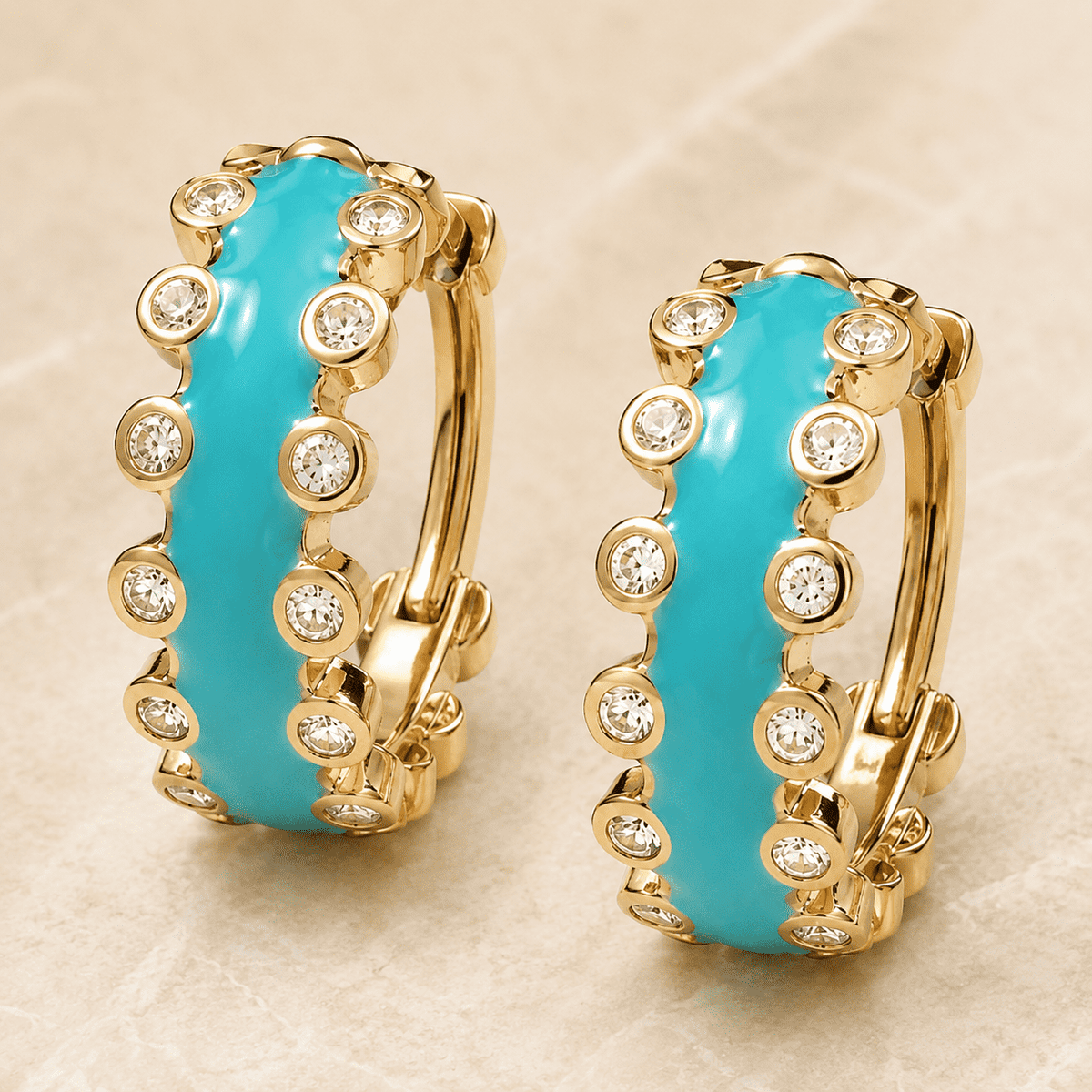 The Capri Blue Mini Hoops — Gold Plated Azure Glow Hoop Earrings by House of Zena, worn on model