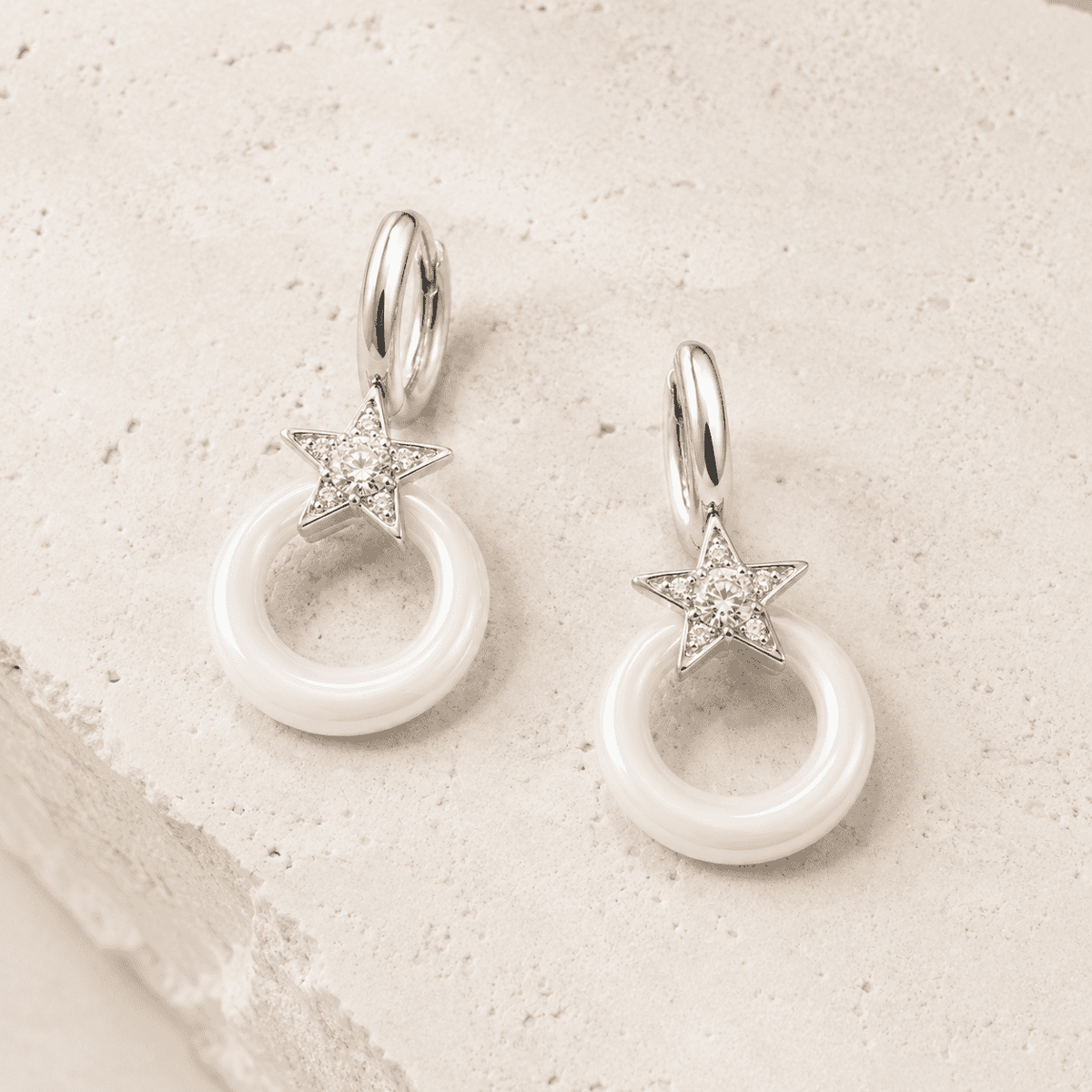 The Happy Tears Solitaire Drops — Silver-Tone Halo Drop Earrings by House of Zena, side angle