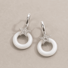 The Happy Tears Solitaire Drops — Silver-Tone Halo Drop Earrings by House of Zena, worn on model