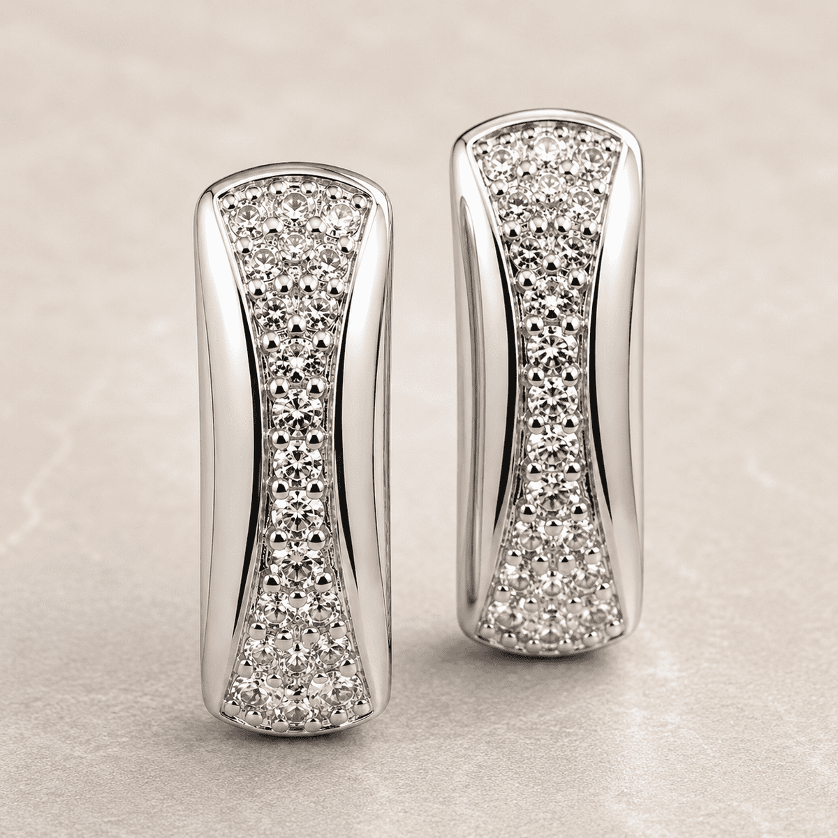 The Fortune Cookie Studs — Silver-Tone Curve Stud Earrings by House of Zena, styled on model
