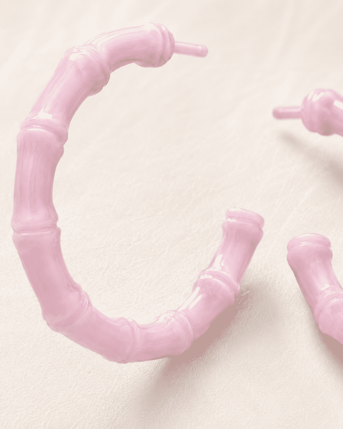 The Rose Quartz Bamboo Hoops — Gold Plated Blush Bamboo Hoop Earrings by House of Zena, styled on model