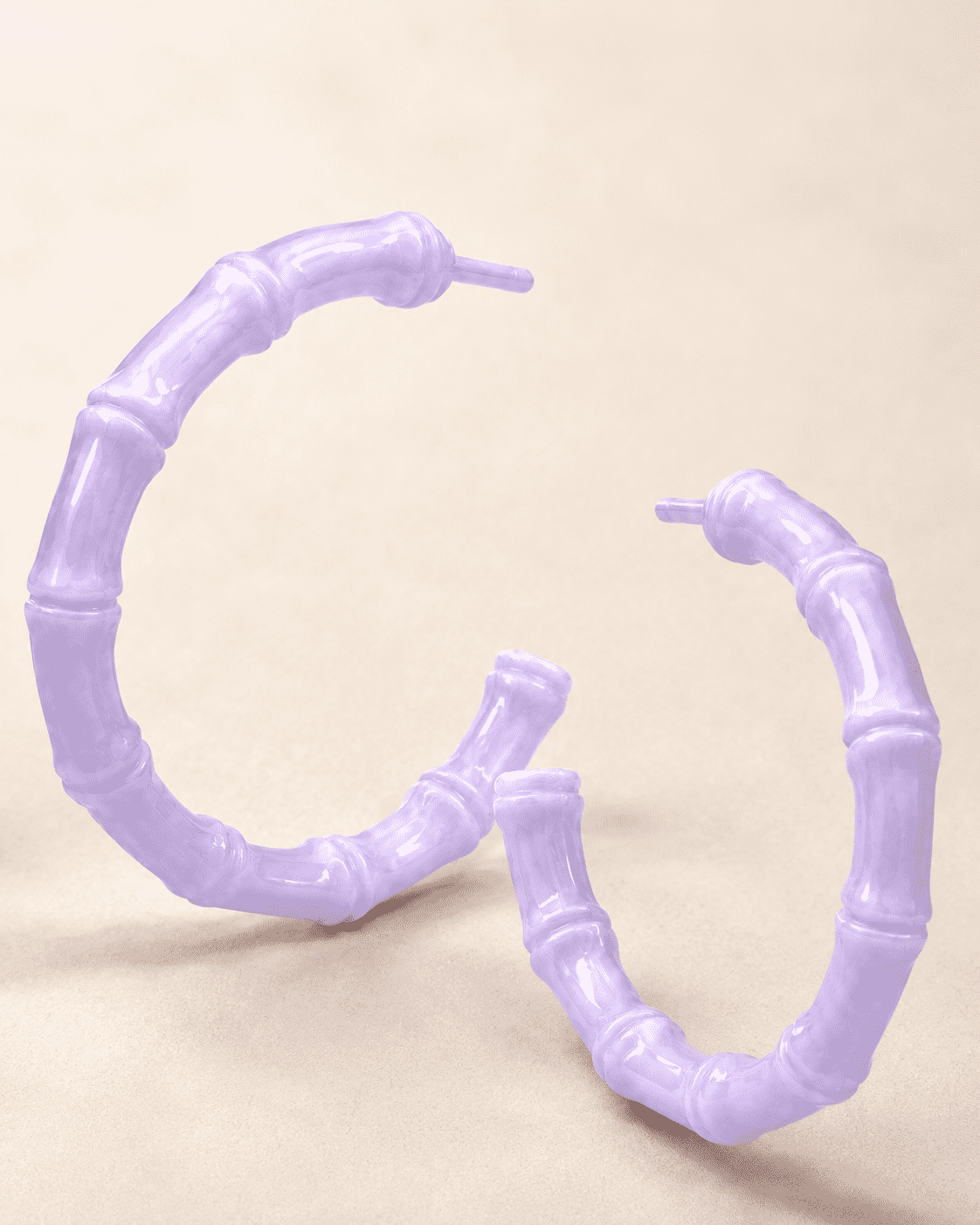 The Taro Milk Bamboo Hoops — Gold Plated Lavender Bamboo Hoop Earrings by House of Zena, styled on model