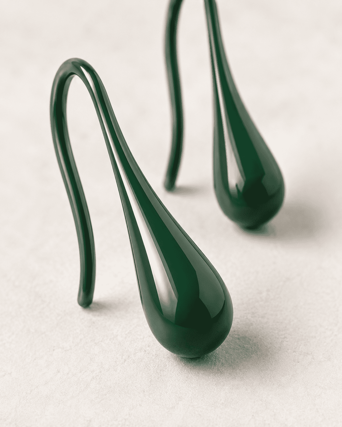 The Green Apple Mini Huggies — Gold Plated Emerald Drop Huggie Earrings by House of Zena, close-up detail
