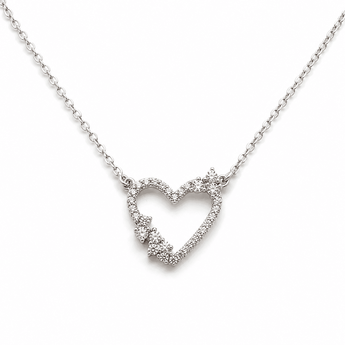 The "Wear Your Heart" Floating Pendant — Gold Plated Open Heart Necklace by House of Zena, flat lay