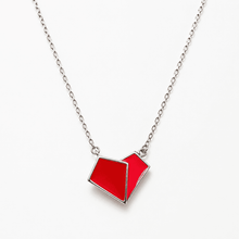 The Cherry Duo Solitaire Pendant — Silver-Tone Duo Pendant Necklace by House of Zena, flat lay