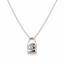 The "Mind Your Business" Padlock — Silver-Tone Lock Evil Eye Necklace by House of Zena, flat lay