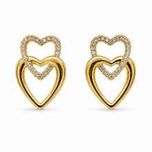 The First Crush Twin Hearts — Gold Plated Twin Heart Earrings by House of Zena, worn on model