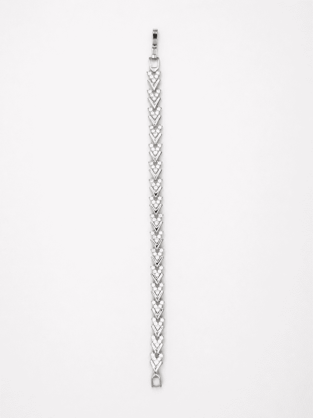 The St. Tropez Chevron Tennis — Silver-Tone Chevron Bracelet by House of Zena, worn on model