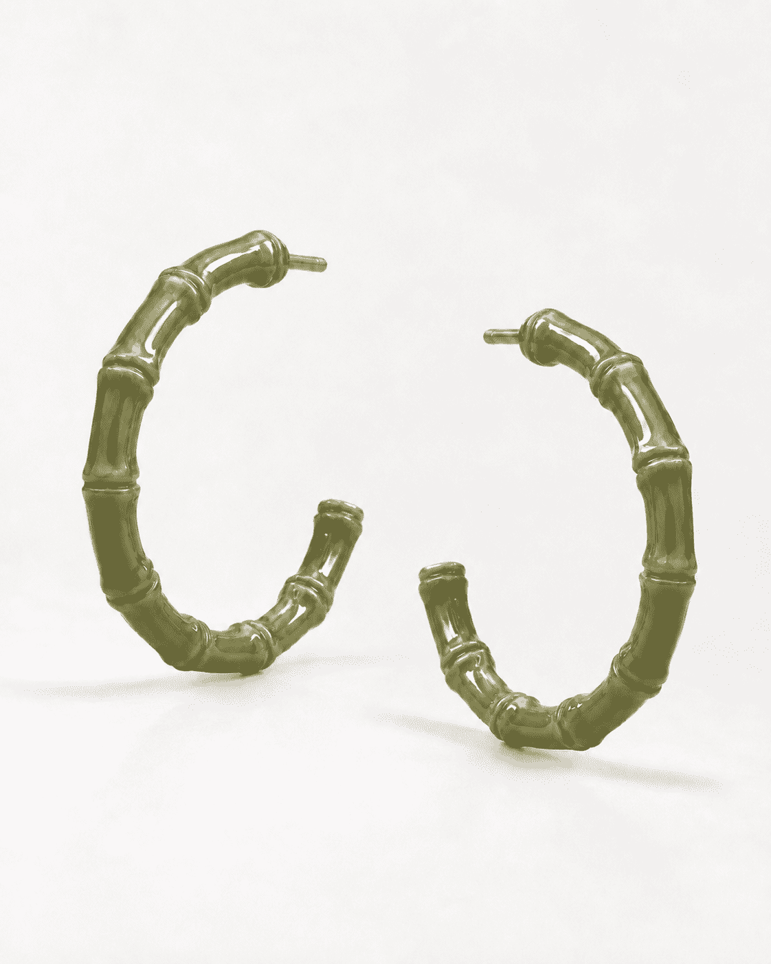The Olive Martini Bamboo Hoops — Gold Plated Olive Bamboo Hoop Earrings by House of Zena, worn on model
