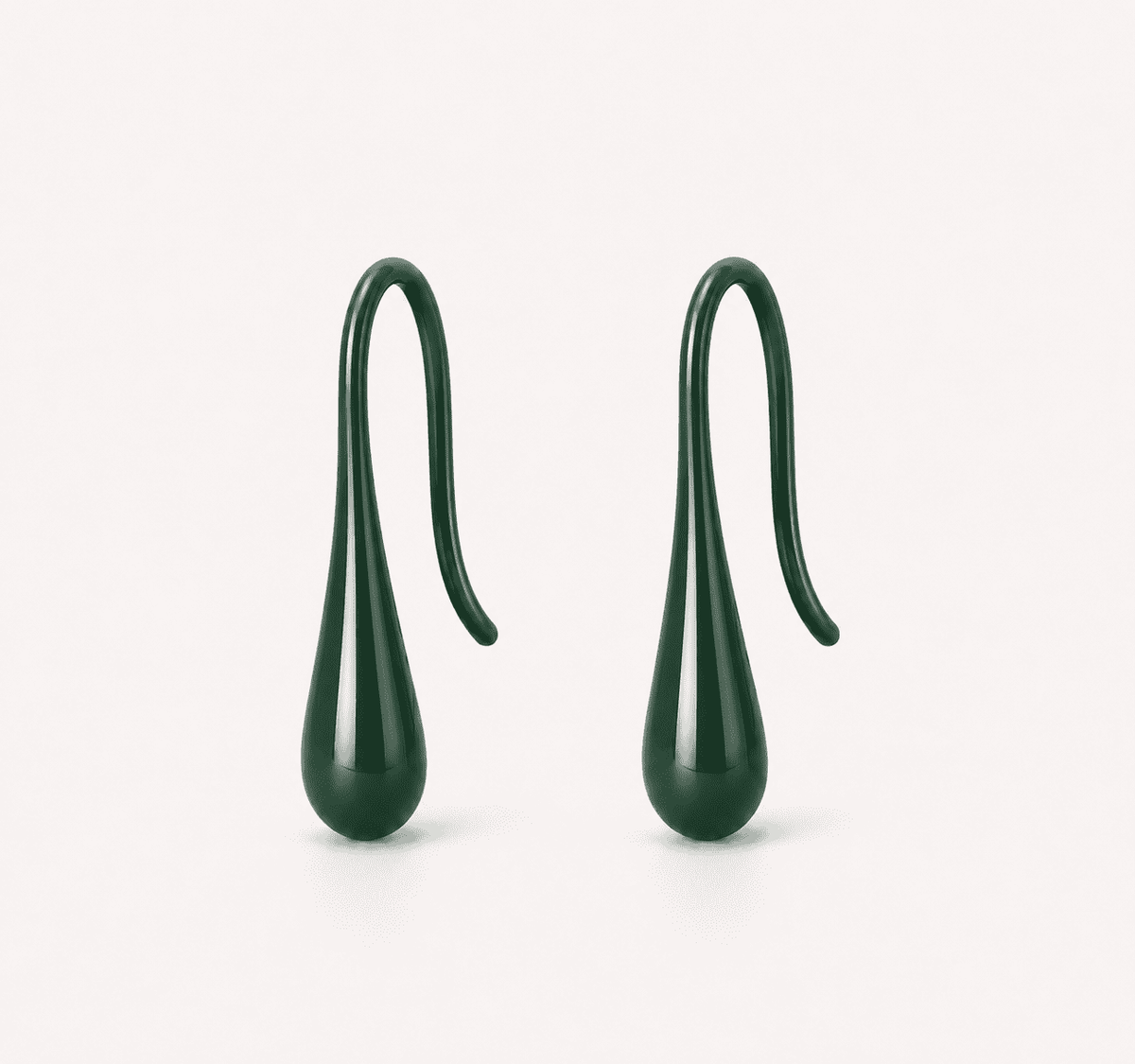 The Green Apple Mini Huggies — Gold Plated Emerald Drop Huggie Earrings by House of Zena, flat lay